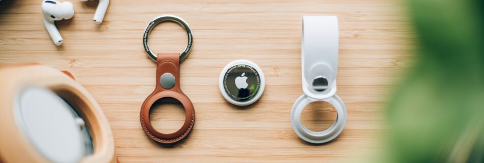 white and orange magnifying glass on brown wooden table